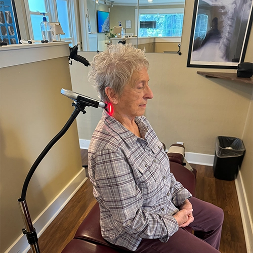 Chiropractic Marysville WA Woman Receiving Laser Therapy