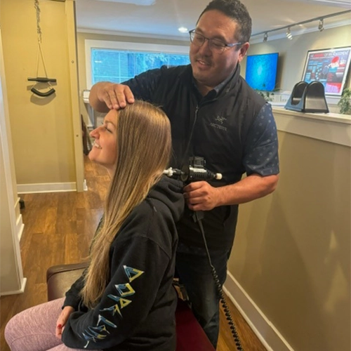 Chiropractor Marysville WA Dr. Joe Hong Adjusting Patients Neck